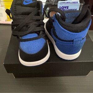 Jordan 1 mid Black and Blue Sneakers